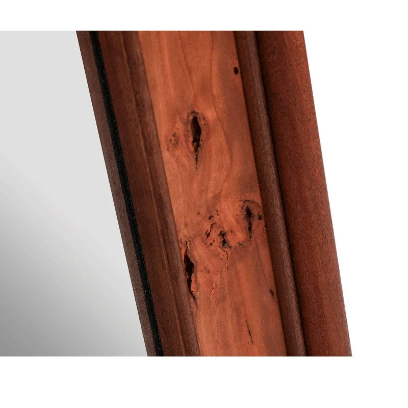 Close-up of a wooden surface with natural grain and knots.