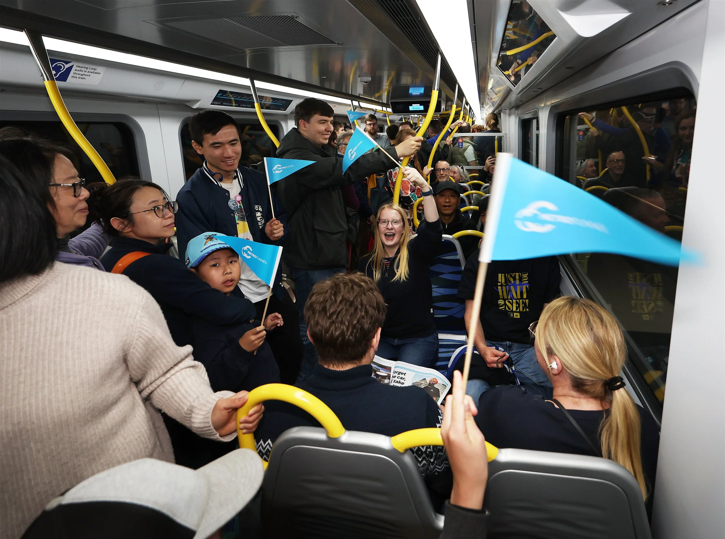 Simple branded flags turned trains and stations into a celebration