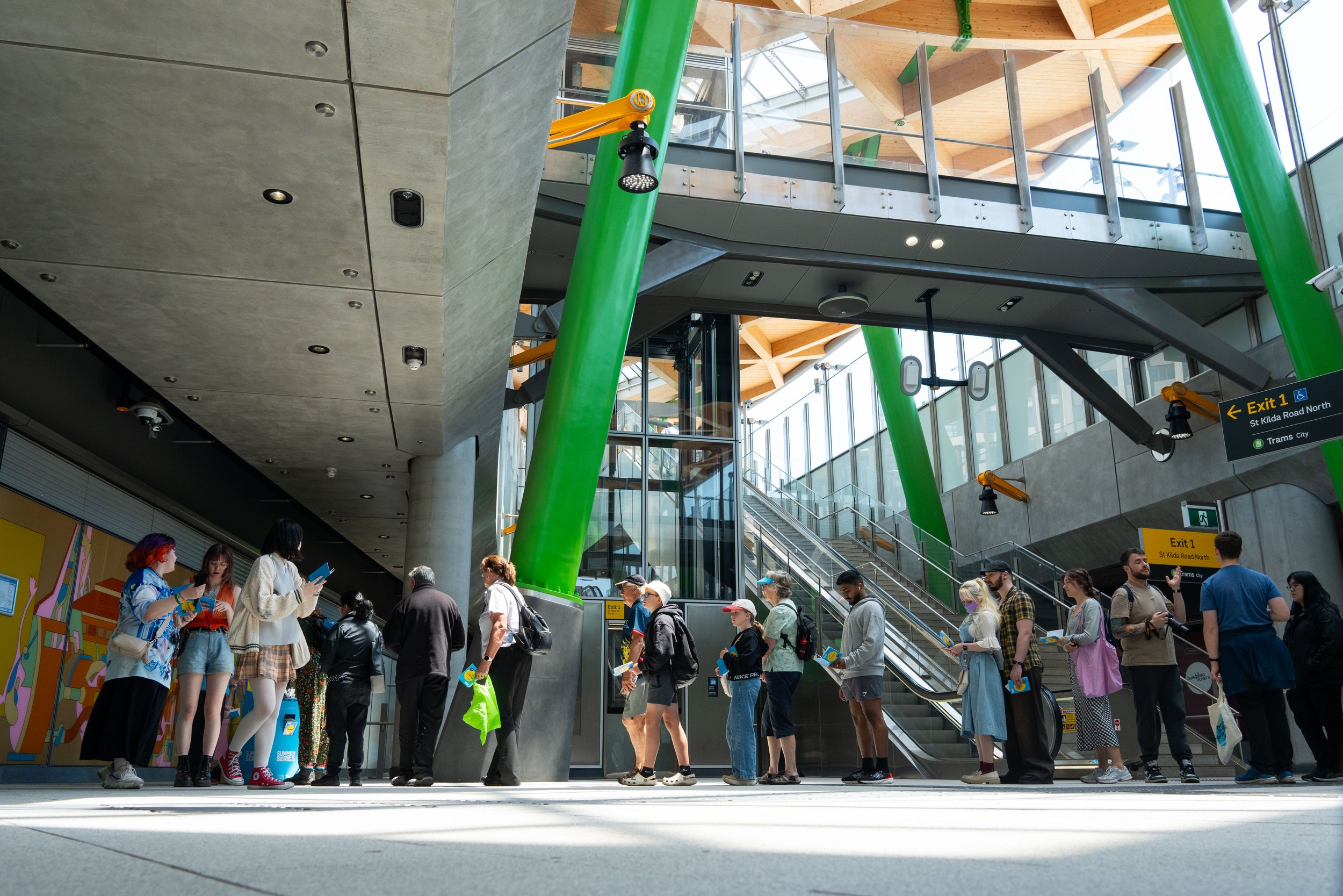 Patient passengers queue for the elusive stamp