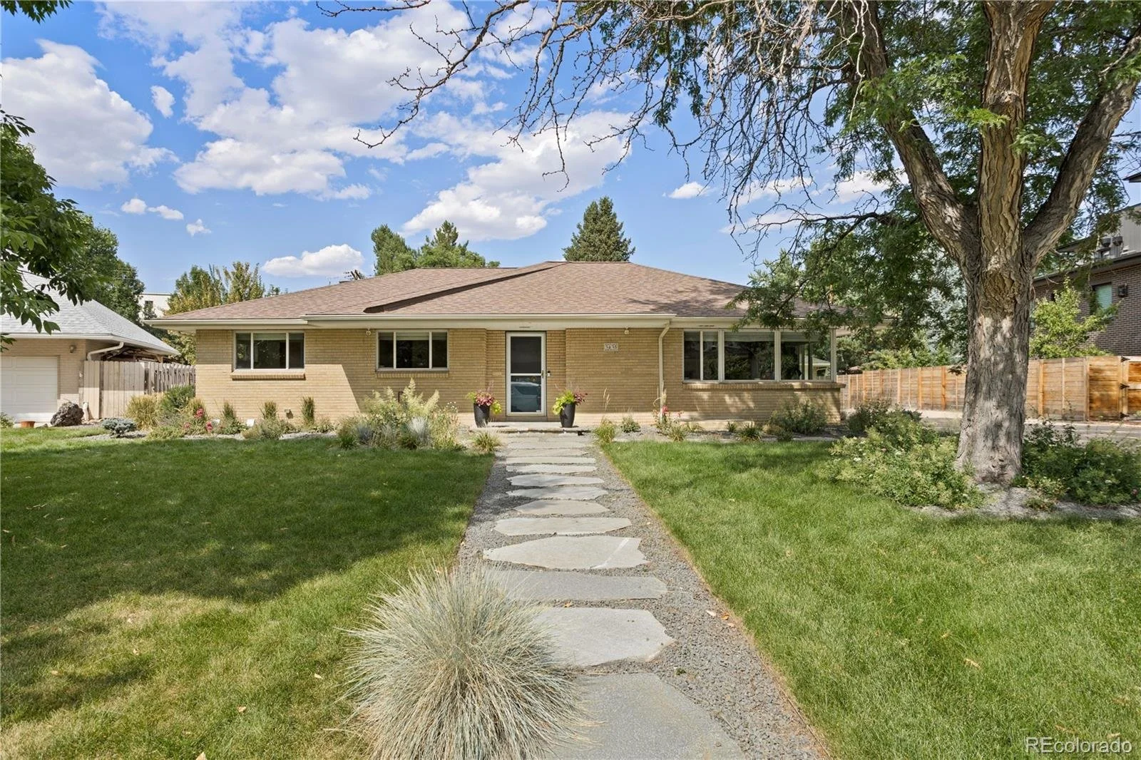 Front exterior of a ranch style home in Cherry Creek, Colorado