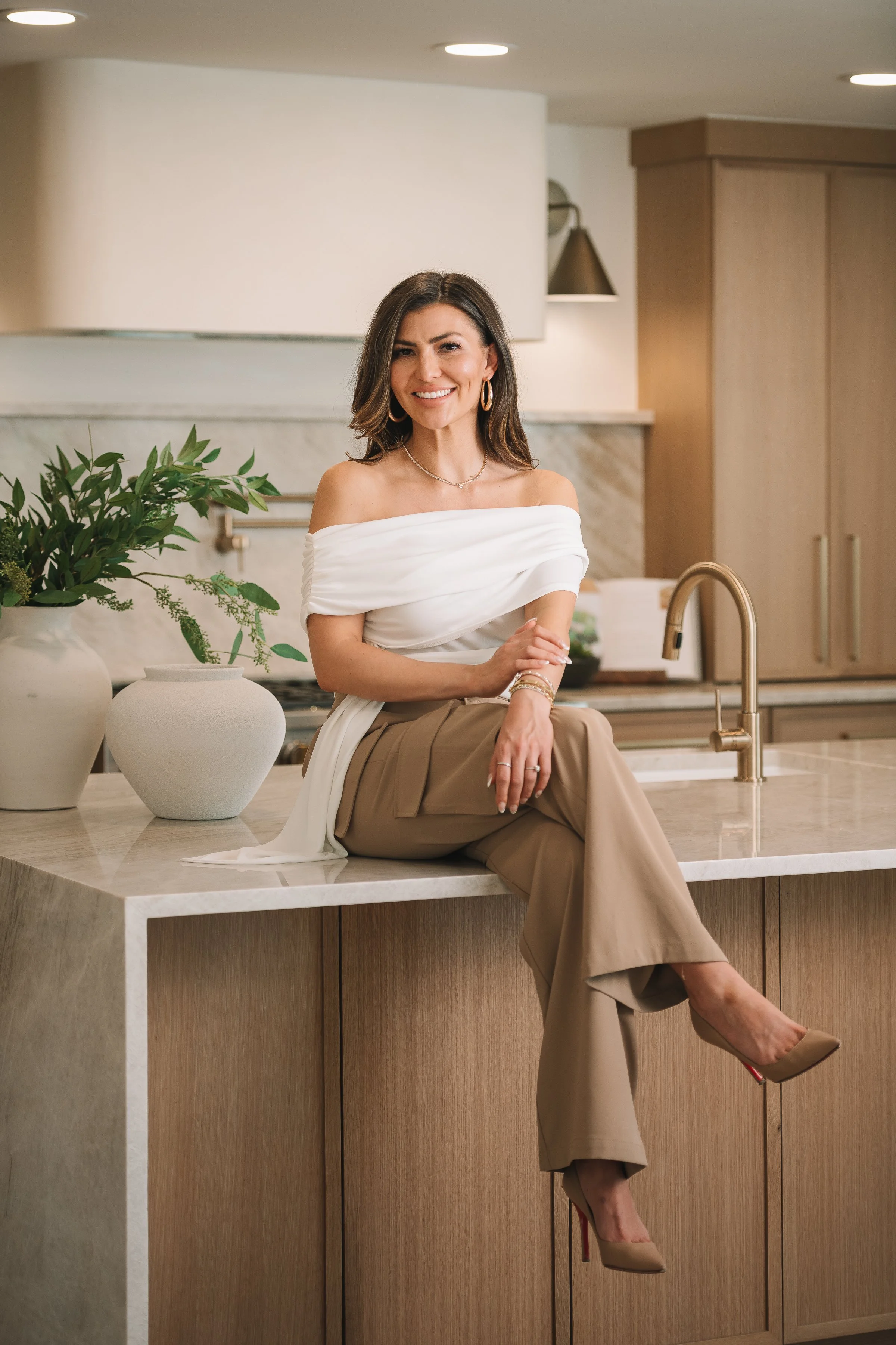 Ashley Lowery of The Lowery Group in a modern luxury home.