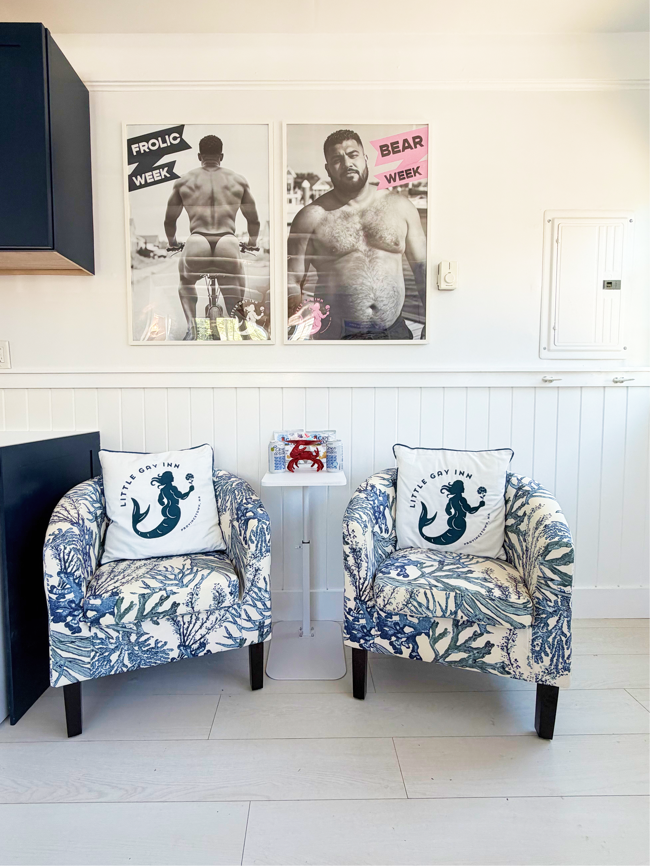 We have seating for two inside The Little Gay Inn and custom artwork.