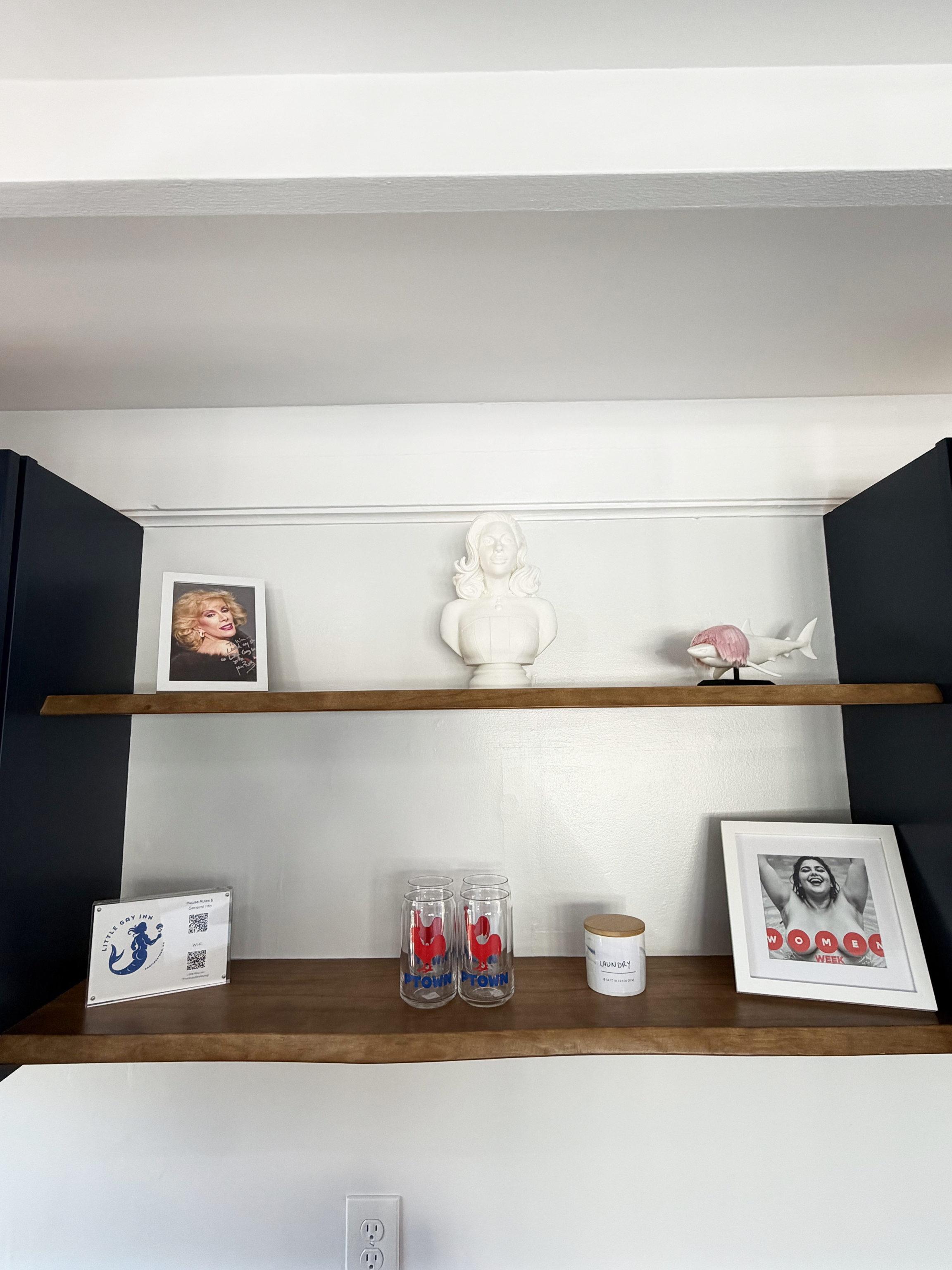 Little Gay Inn kitchen shelves highlighting the queer coastal decor.
