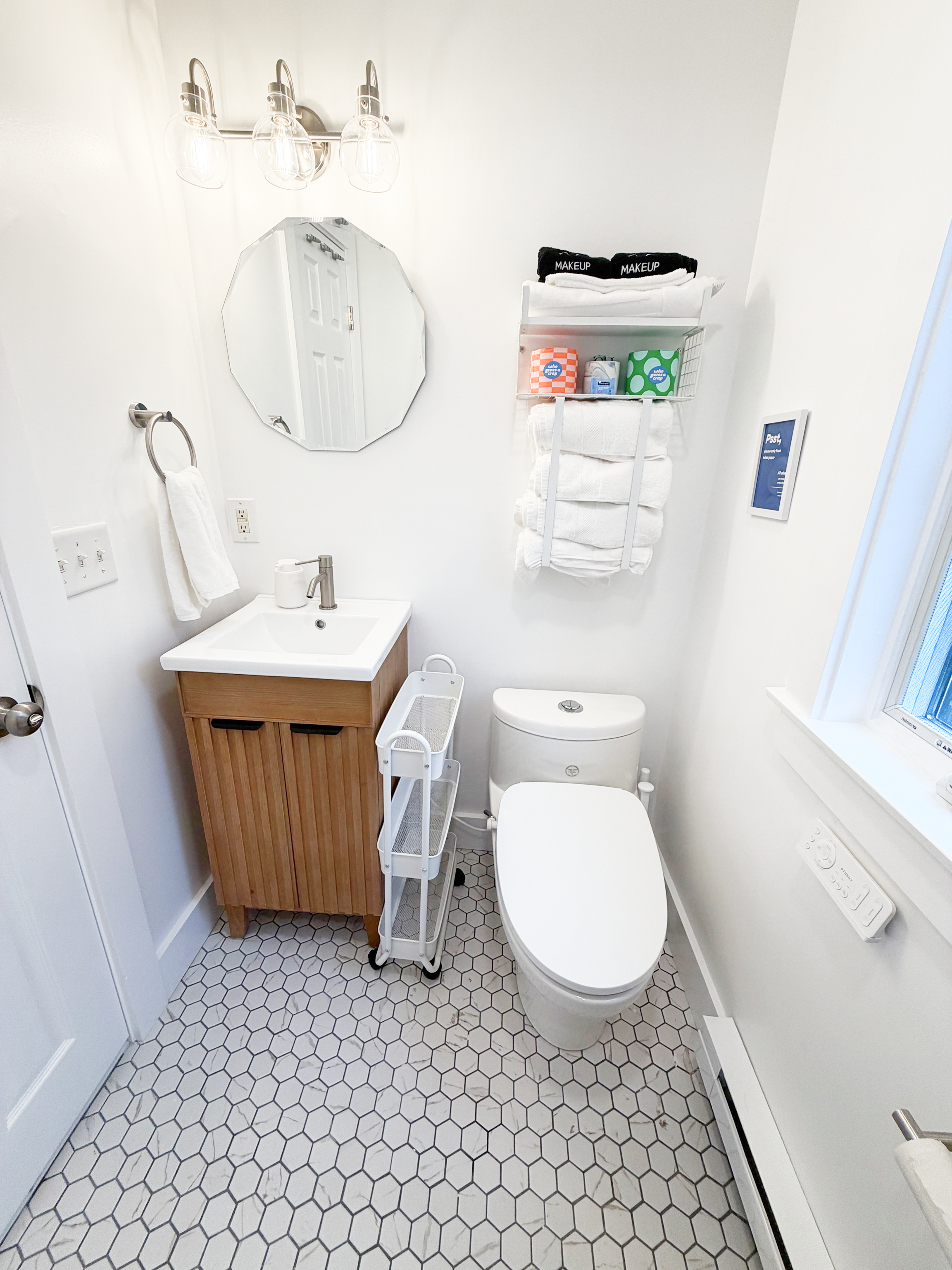Our bathroom has everything you need from storage of you belongs, an electric bidet, make up towels, and more.