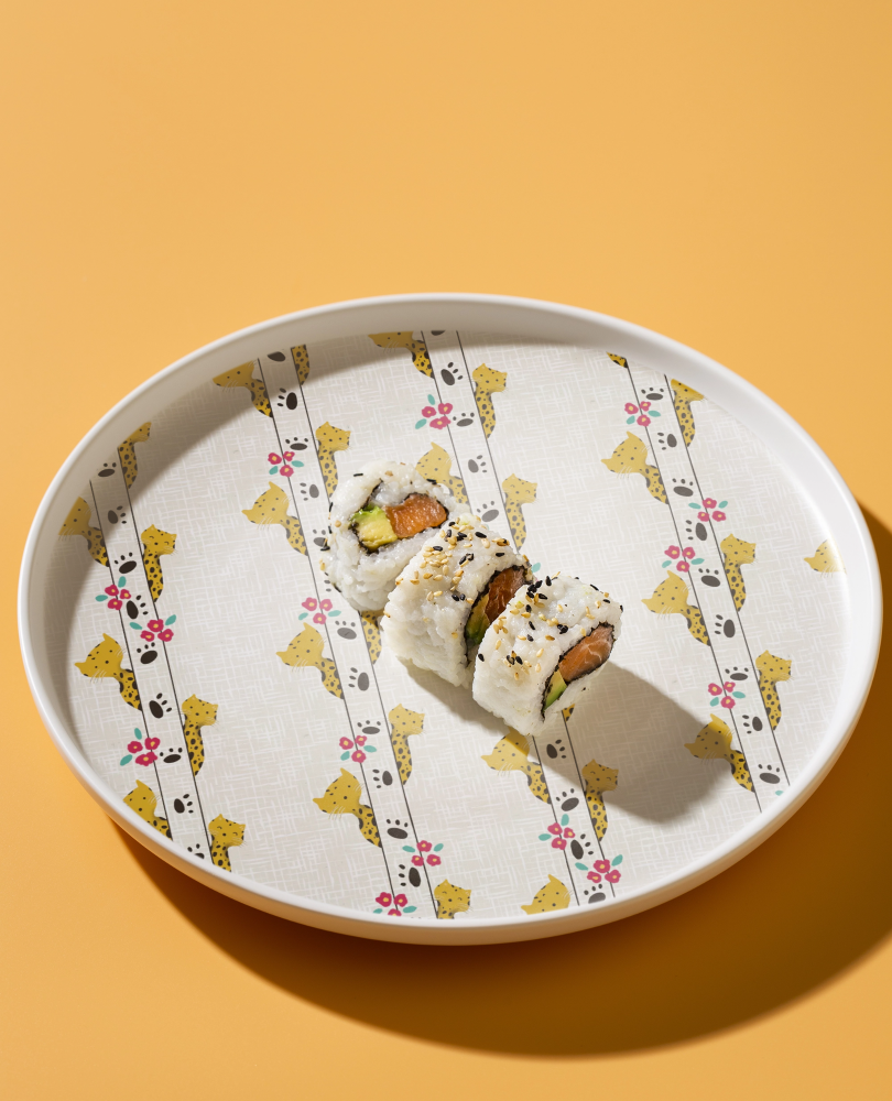 Plate with delicious sushi rolls.png