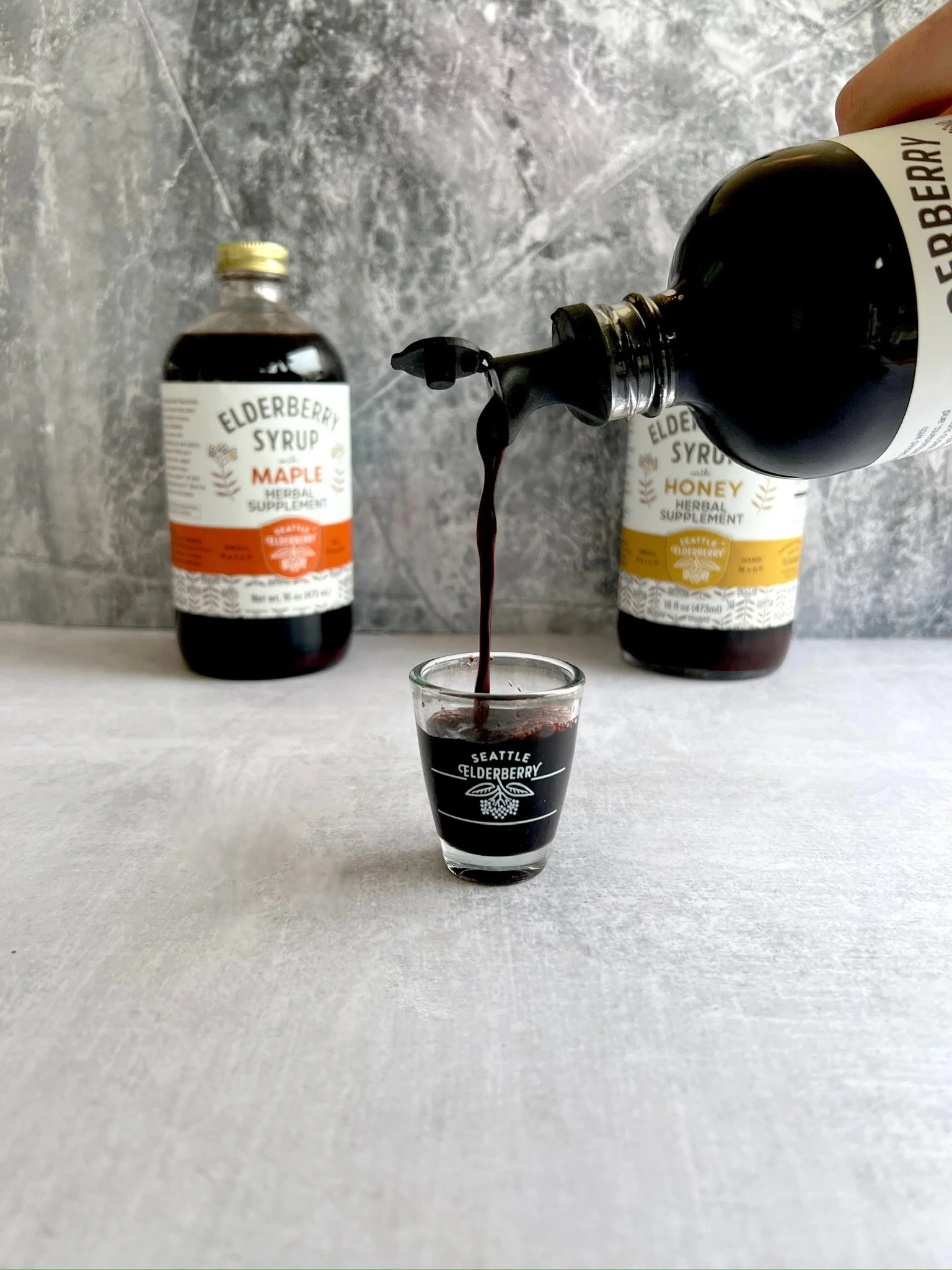 Elderberry syrup pour.JPG