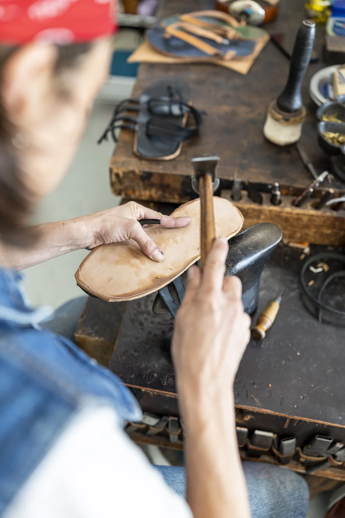 Professional process photography featuring leathworker Jess Robbins of Made By Haptic in Richmond, Virginia.
