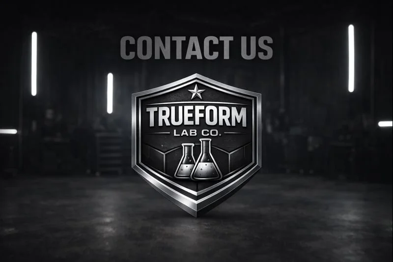 Dark industrial background with illuminated lines, featuring a shield logo for Trueform Lab Co., with two beaker icons inside the shield and the text 'Contact Us' above.