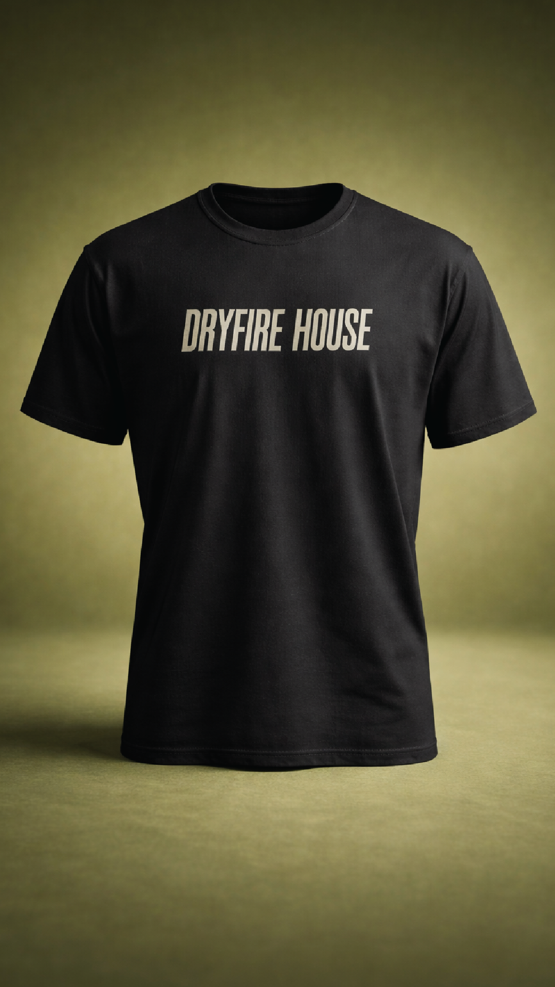 Black T-shirt with 'DRYFIRE HOUSE' text on the front, displayed against a plain green background.