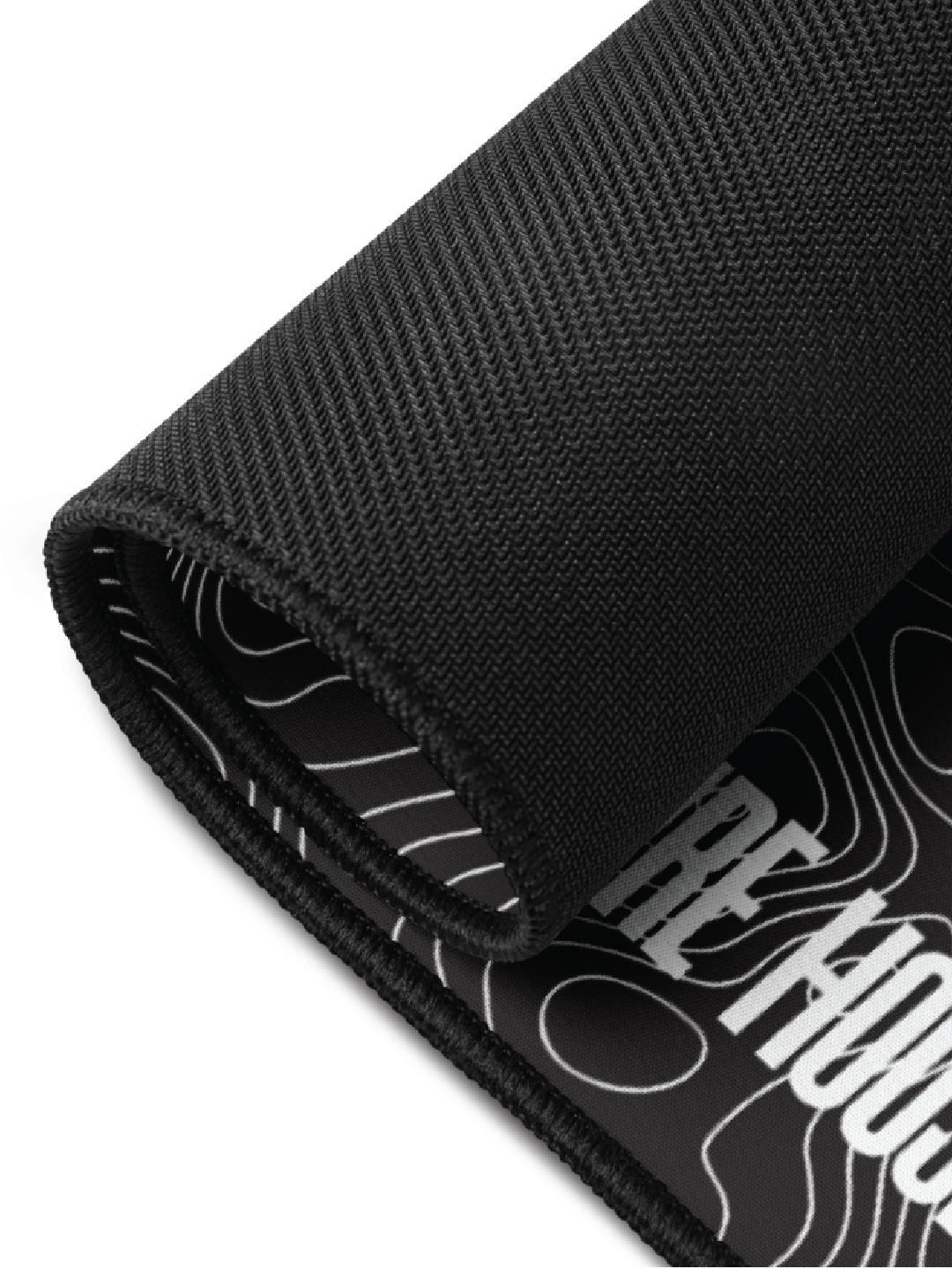 Dryfire House Gun Mat rolled up showing textured exterior and contour interior — dry-fire training accessory