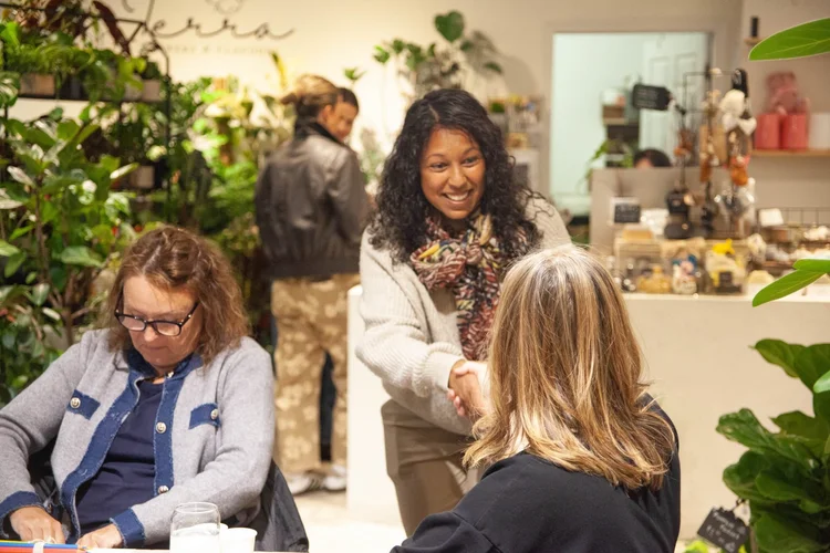 Facilitator greeting guests at a botanical workshop at Terra Flowers and Flavours in Barrhaven
