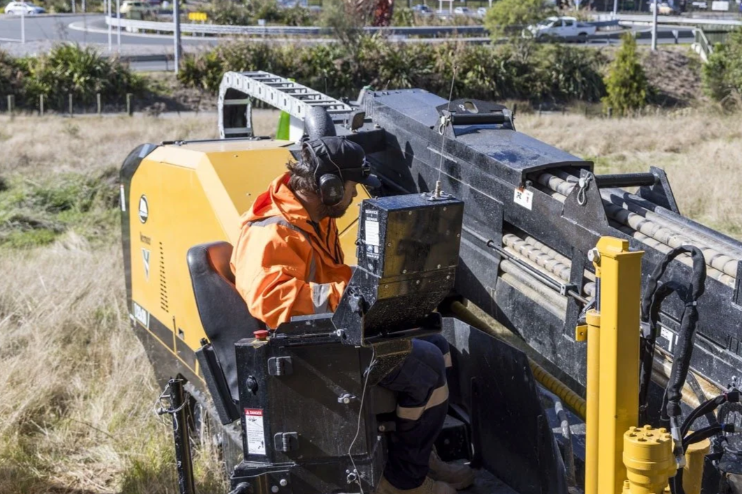 Directional drilling operator working on underground services project in Tauranga, Bay of Plenty