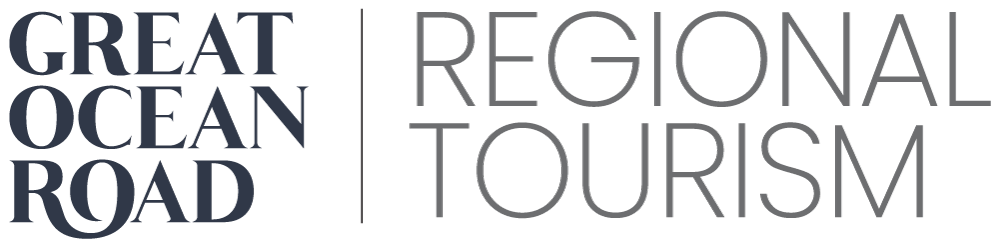 Logo for Great Ocean Road Regional Tourism featuring stylized text in dark blue and gray.