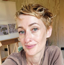 woman with short curly hair