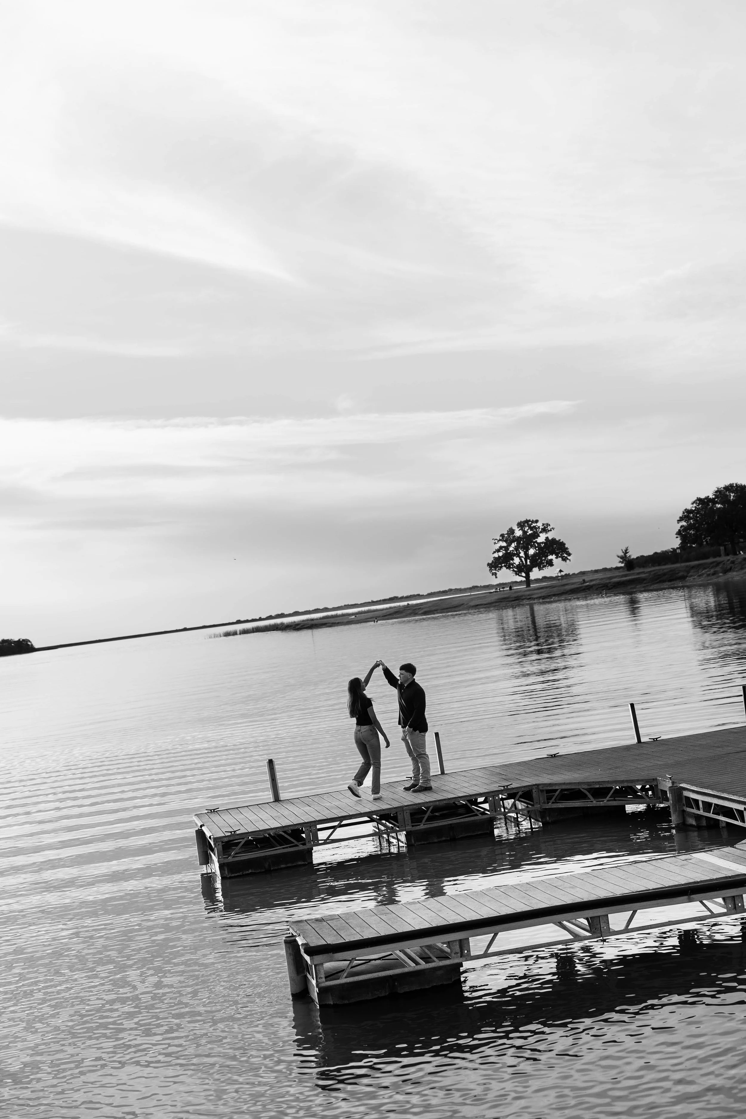 Romantic Texas engagement photos at a lakeside location captured with digital photography.