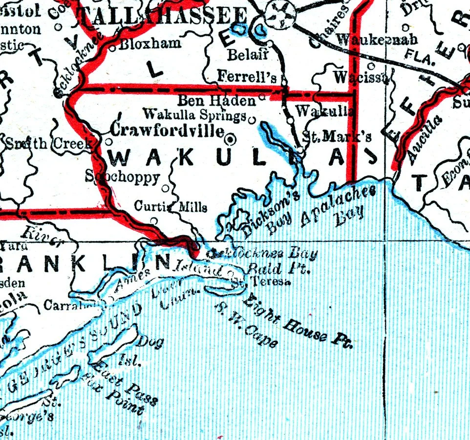 A historical map of Lake Wakulla and surrounding areas in Florida, showing towns, roads, and the Ochlockonee Bay and Apalachee Bay.