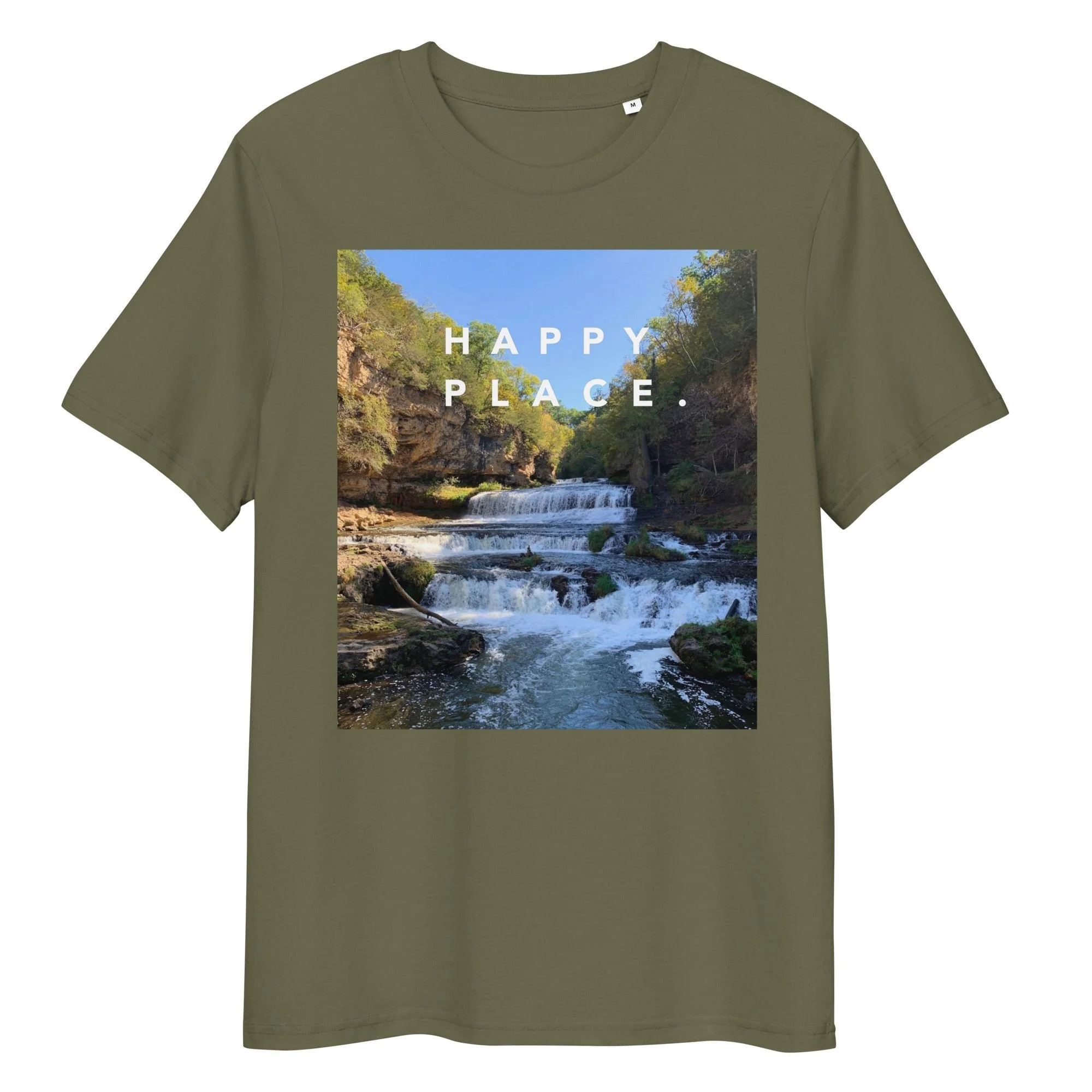 Green t-shirt featuring an image of a waterfall surrounded by greenery and the words "HAPPY PLACE." printed on it.