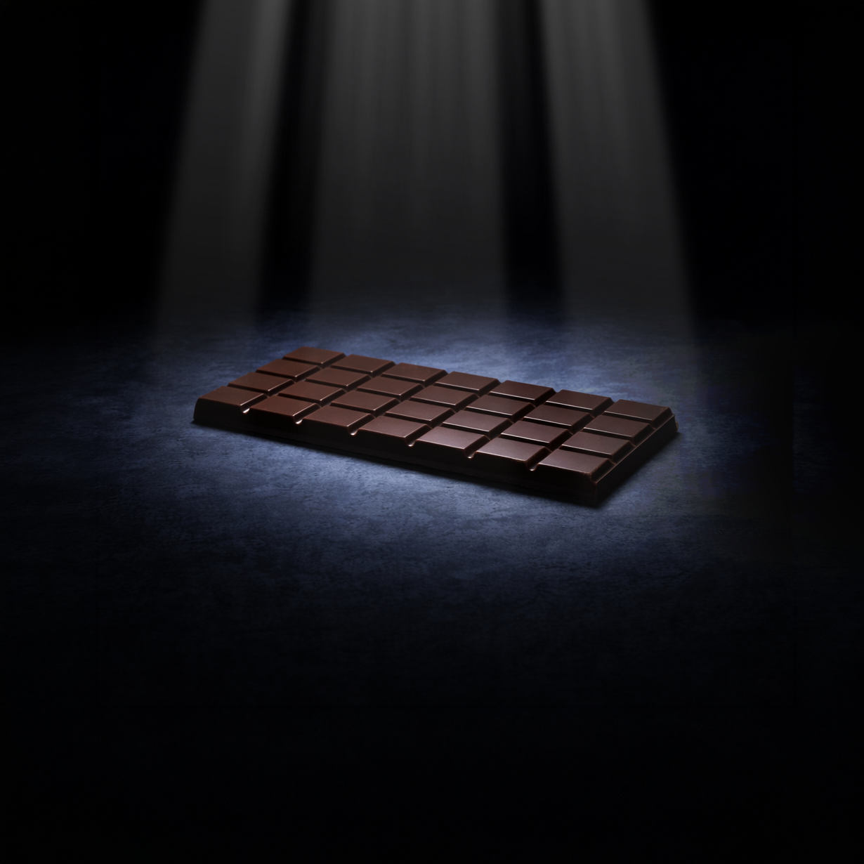 Chocolate is dangerous for cats because of theobromine and caffeine, which their bodies cannot break down efficiently. Dark, more potent chocolates are most harmful.