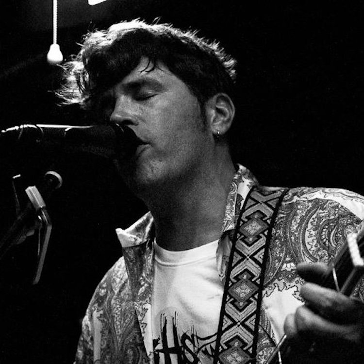 Allen Bush performing live at a local bar venue