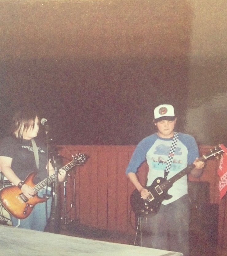 Annie and Brian playing their first show at cool beans in Denton Texas on the roof - circa 2004… the Swank days!