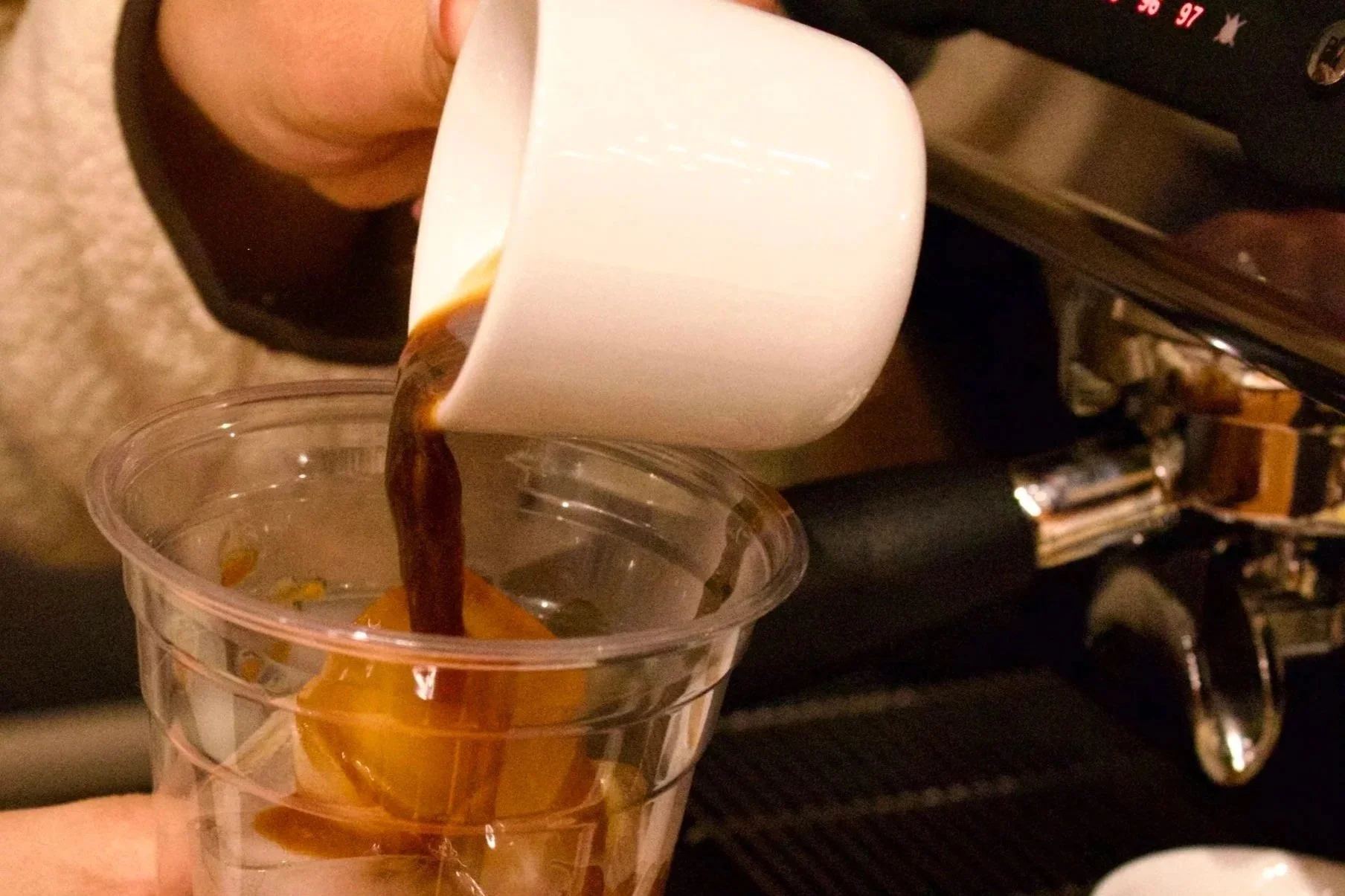 Fresh espresso poured over ice at Milk n Honey Coffee Company’s Signature Cart, offering upscale coffee cart catering for Minnesota weddings, brand activations, and corporate events in the Twin Cities.
