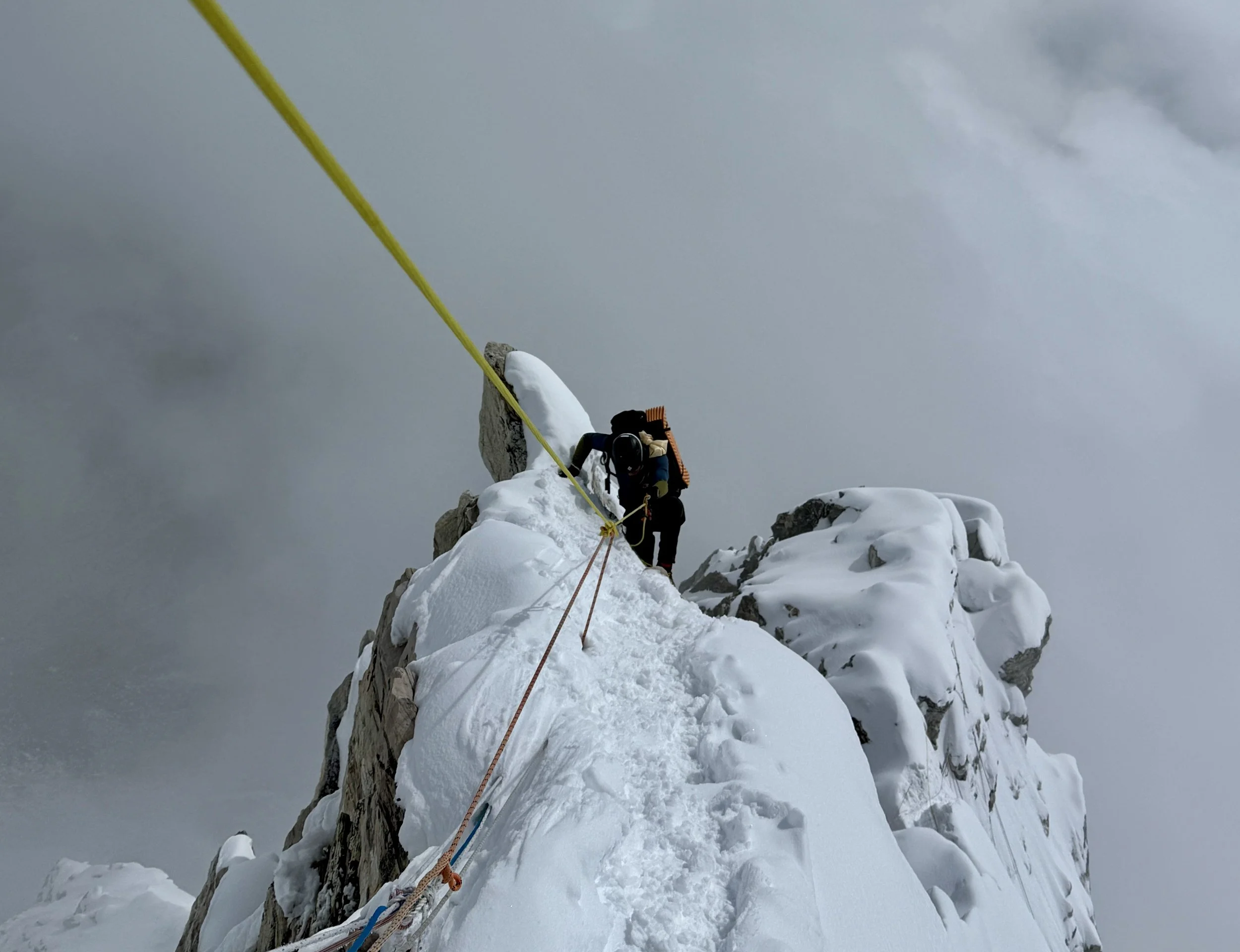 Sittng at the top of Ama Dablam