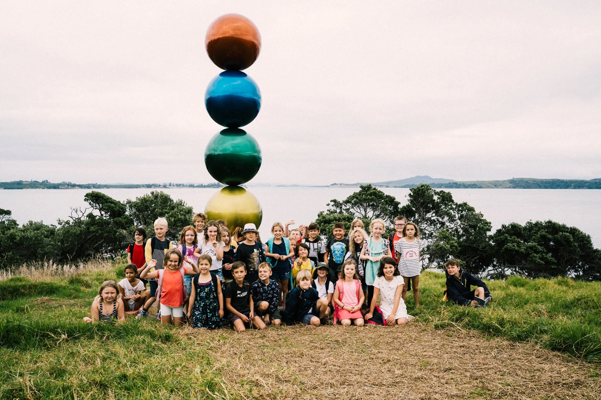 Round and Round sculpture by Leon van den Eijkel, set above the Hauraki Gulf on the Matiatia Headland walkway.