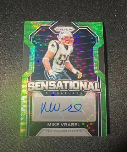 Sports trading card featuring Mike Vrabel in football uniform, with holographic green and purple border, labeled "Sensational Signatures," signed autograph space, and the text "Mike Vrabel, New England Patriots."