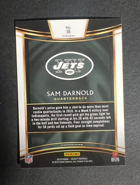 Football trading card of Sam Darnold, a quarterback for the New York Jets, with team logo and bio details.