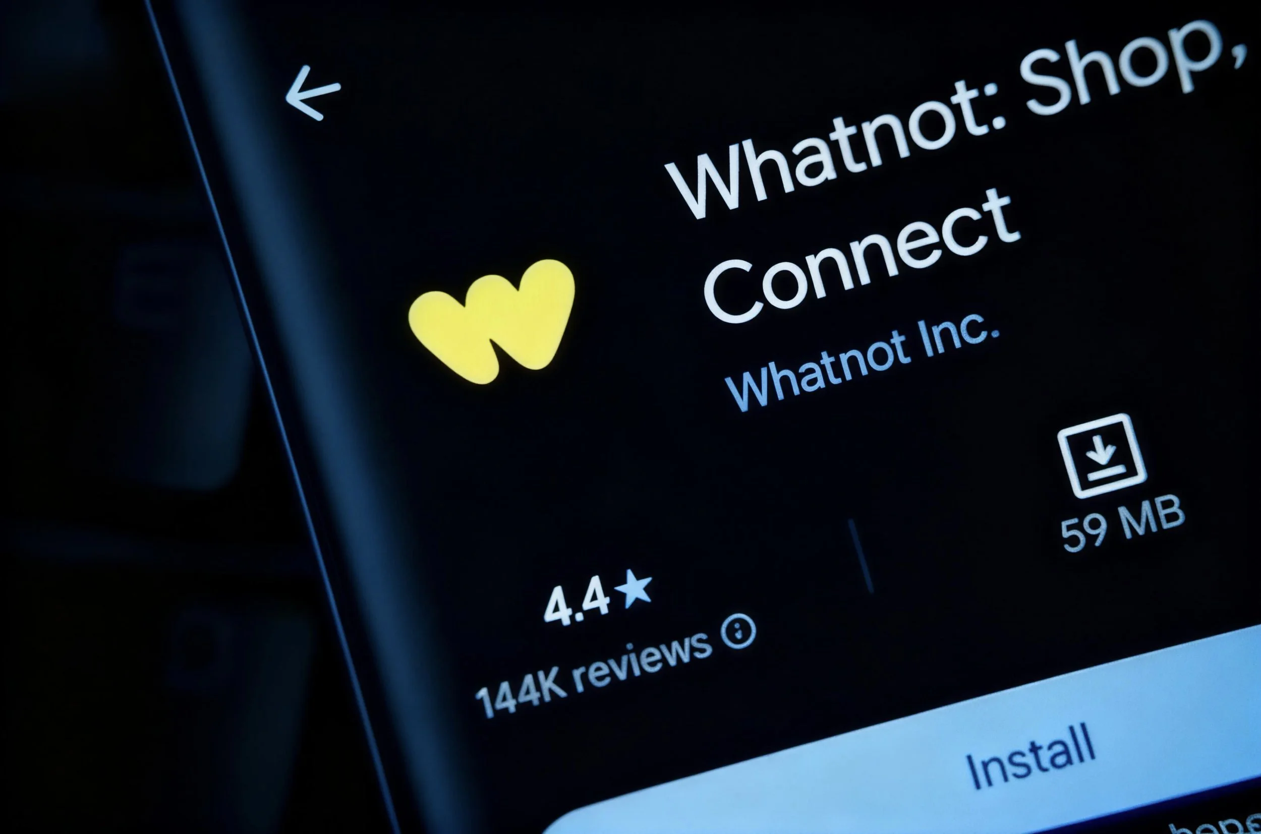 Mobile phone screen displaying the Whatnot app listing, with the app's yellow W logo, app name 'Whatnot Connect,' 4.4-star rating from 144K reviews, size 59 MB, and an install button.