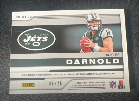 Autographed football trading card of Sam Darnold, New York Jets, with a photo of him in uniform holding a football.