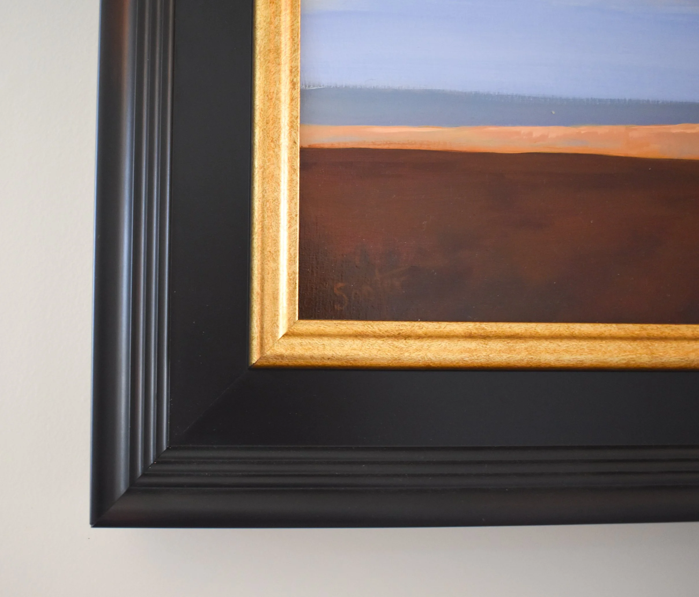 Corner detail of the museum-quality dark espresso frame surrounding the original oil painting Painting Title by Kelly Sooter.