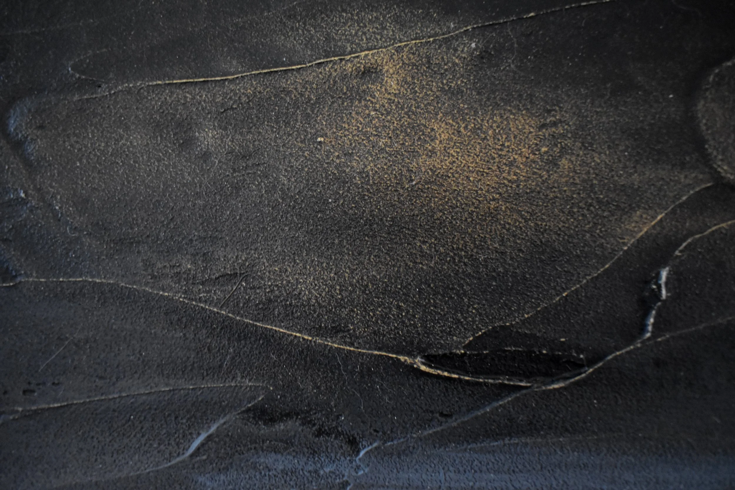 Close-up detail of Enduring Light by Kelly Sooter highlighting the textured night sky, layered paint surface, and subtle tonal variations created through a reductive painting process.