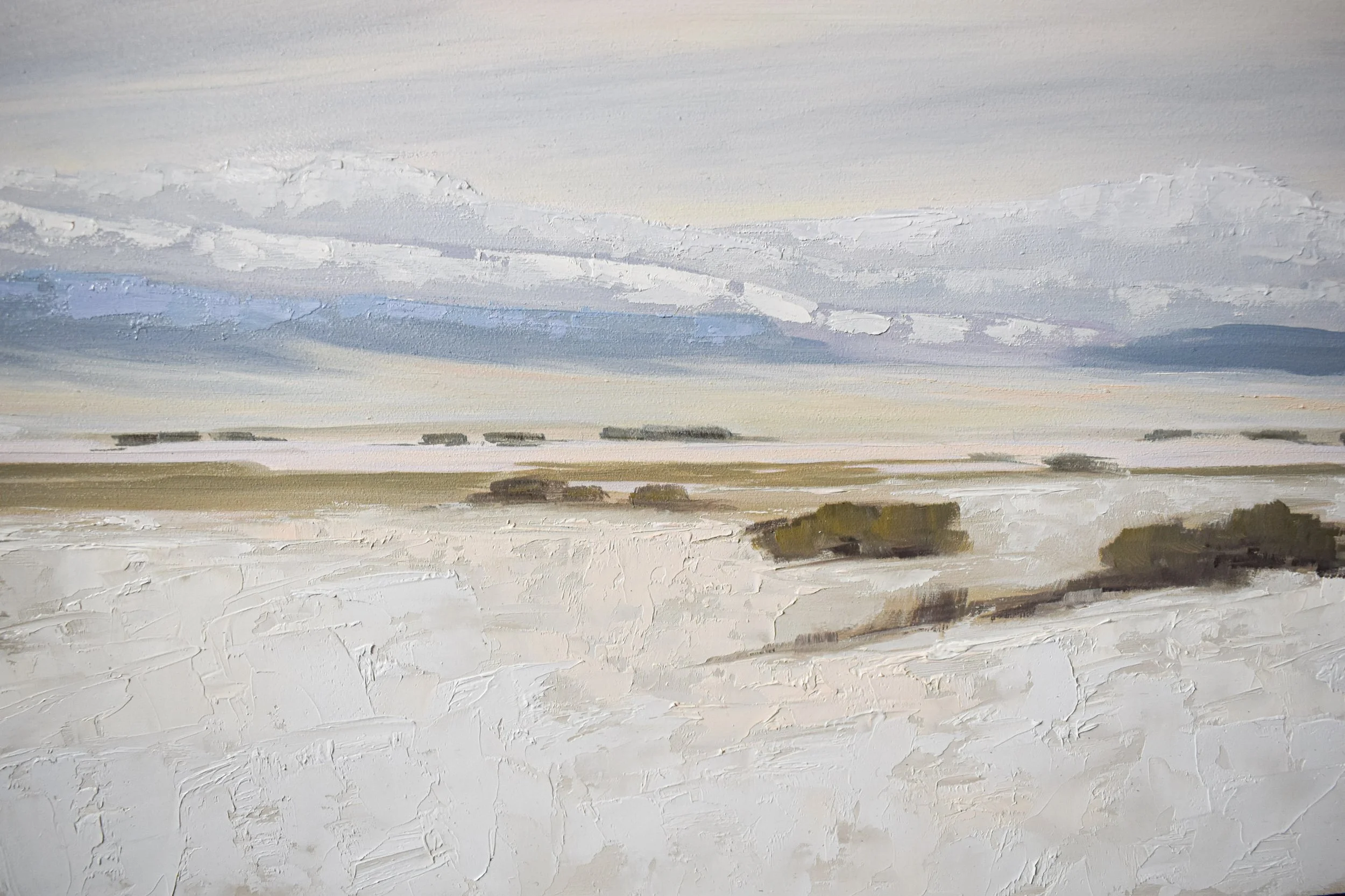 Detail of "Dangerous Beauty" by Kelly Sooter showing the expansive snow-covered landscape, layered oil paint, and subtle atmospheric transitions.