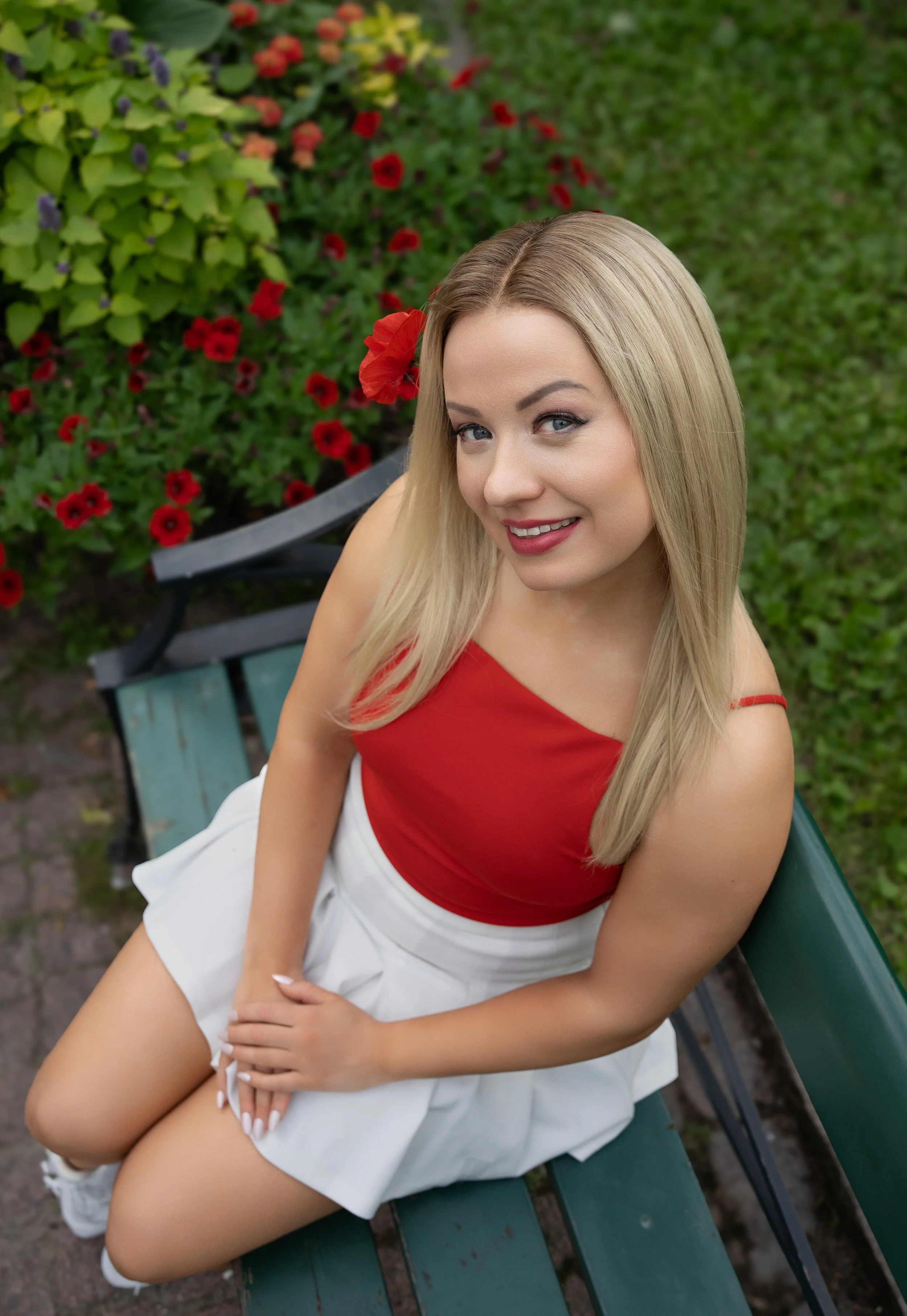 A young woman with long blonde human hair wig