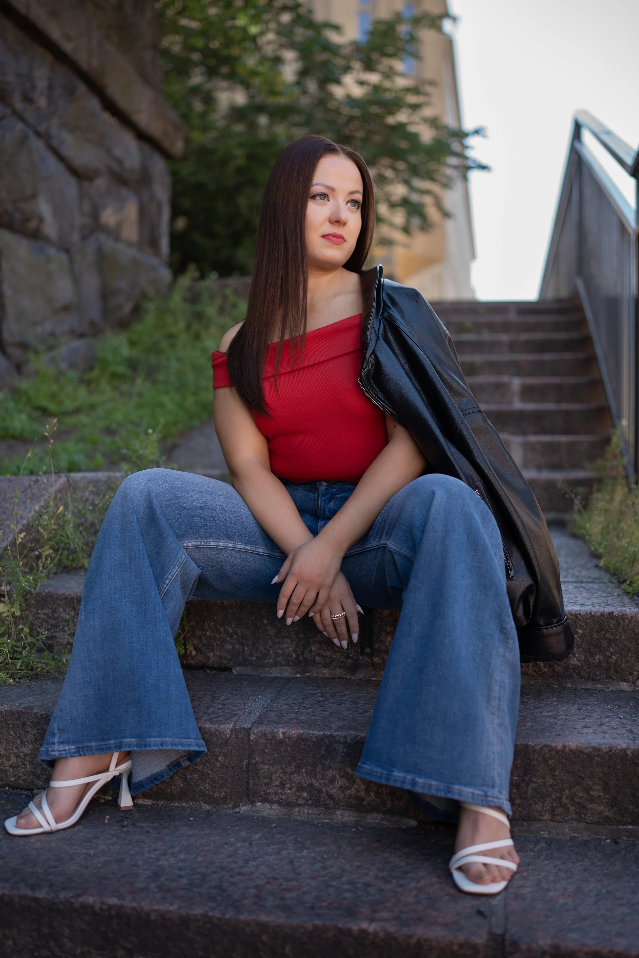 A woman with long brown human hair wig