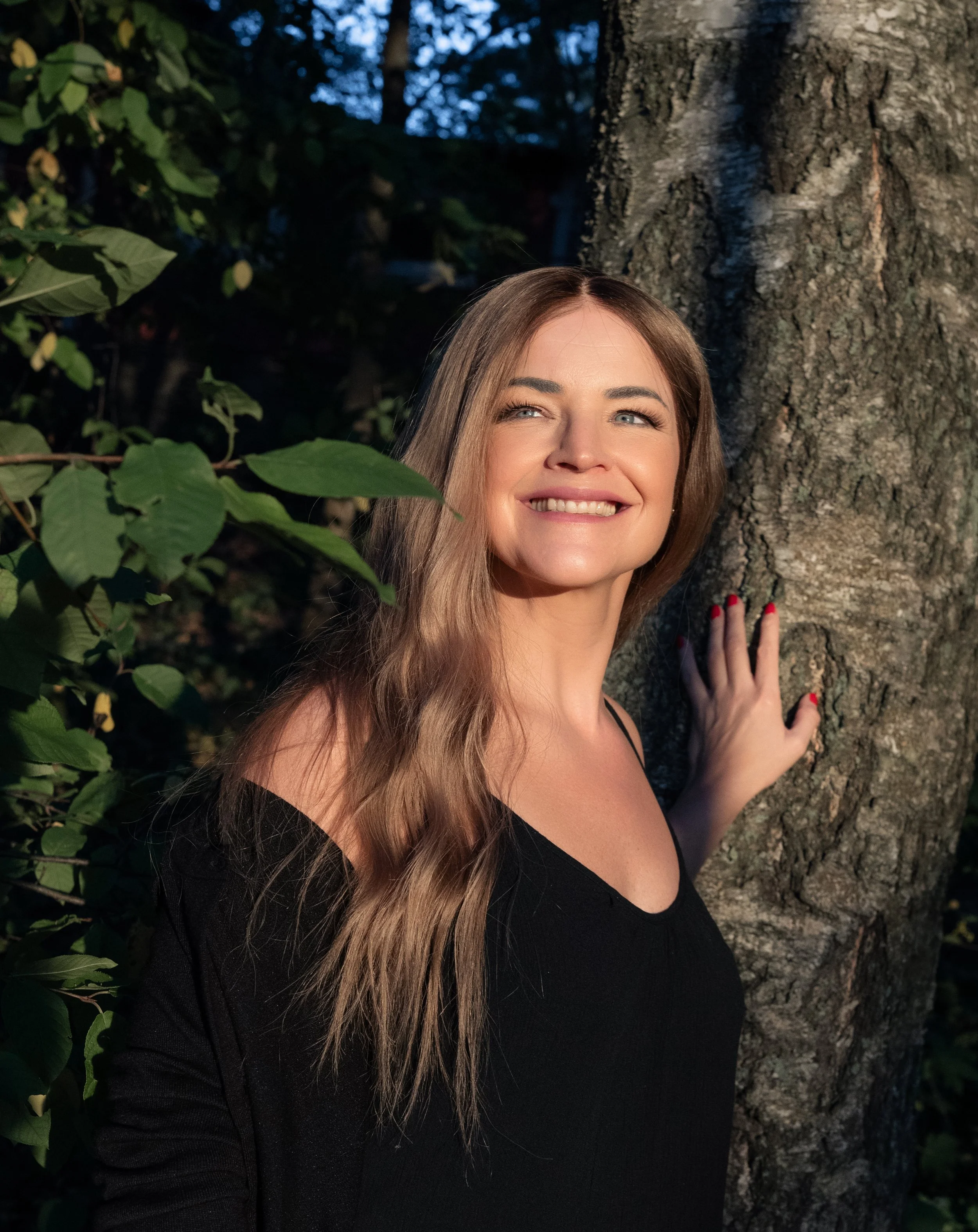 Anne Vainio  wearing a natural hair wig