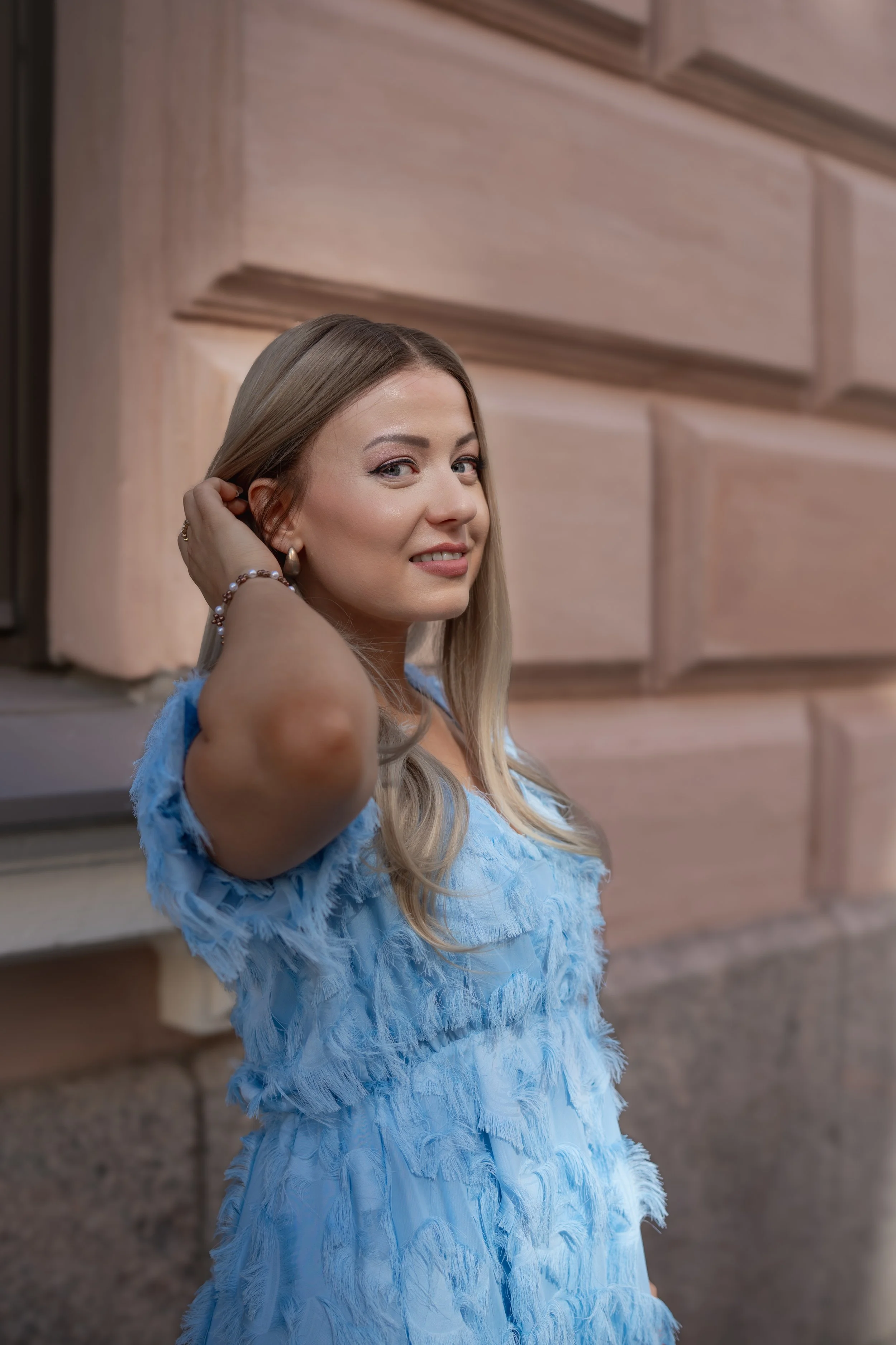 A woman with natural looking blond human hair wig
