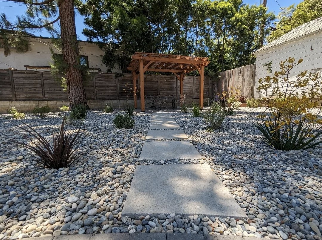 drought tolerant landscape in Los Angeles with pergola and xeriscape