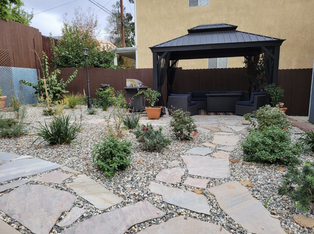 drought tolerant landscape in Los Angeles with flagstone and pergola