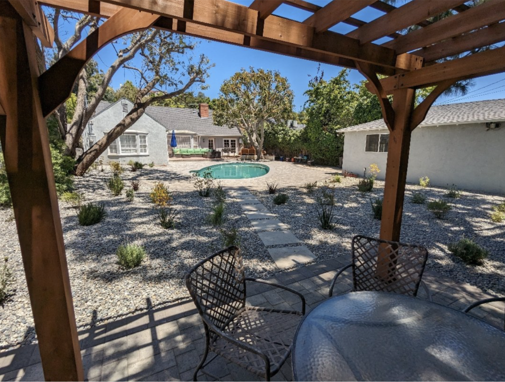 drought tolerant landscape in Los Angeles with pergola and pool