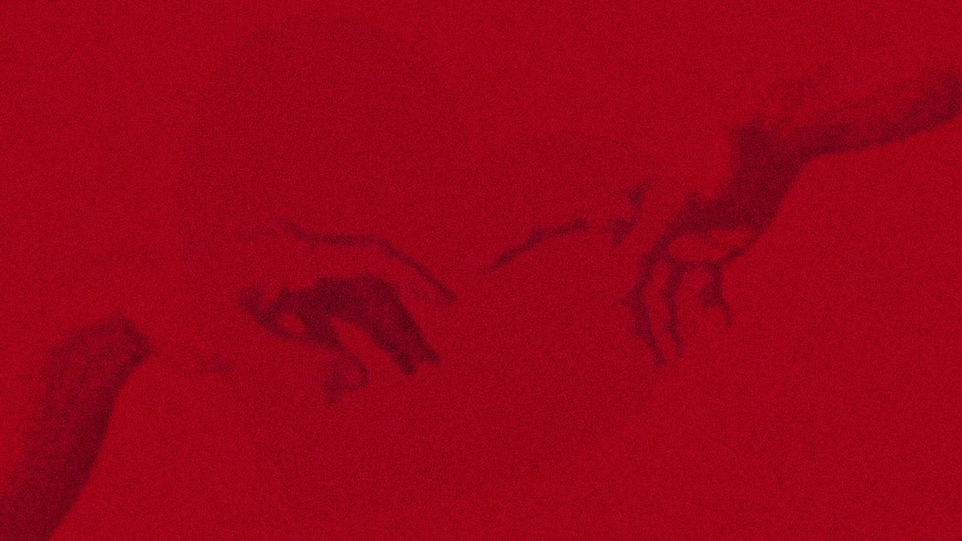 A close-up of a person's arm reaching towards a hand which has reached down to connect, against red modern background.