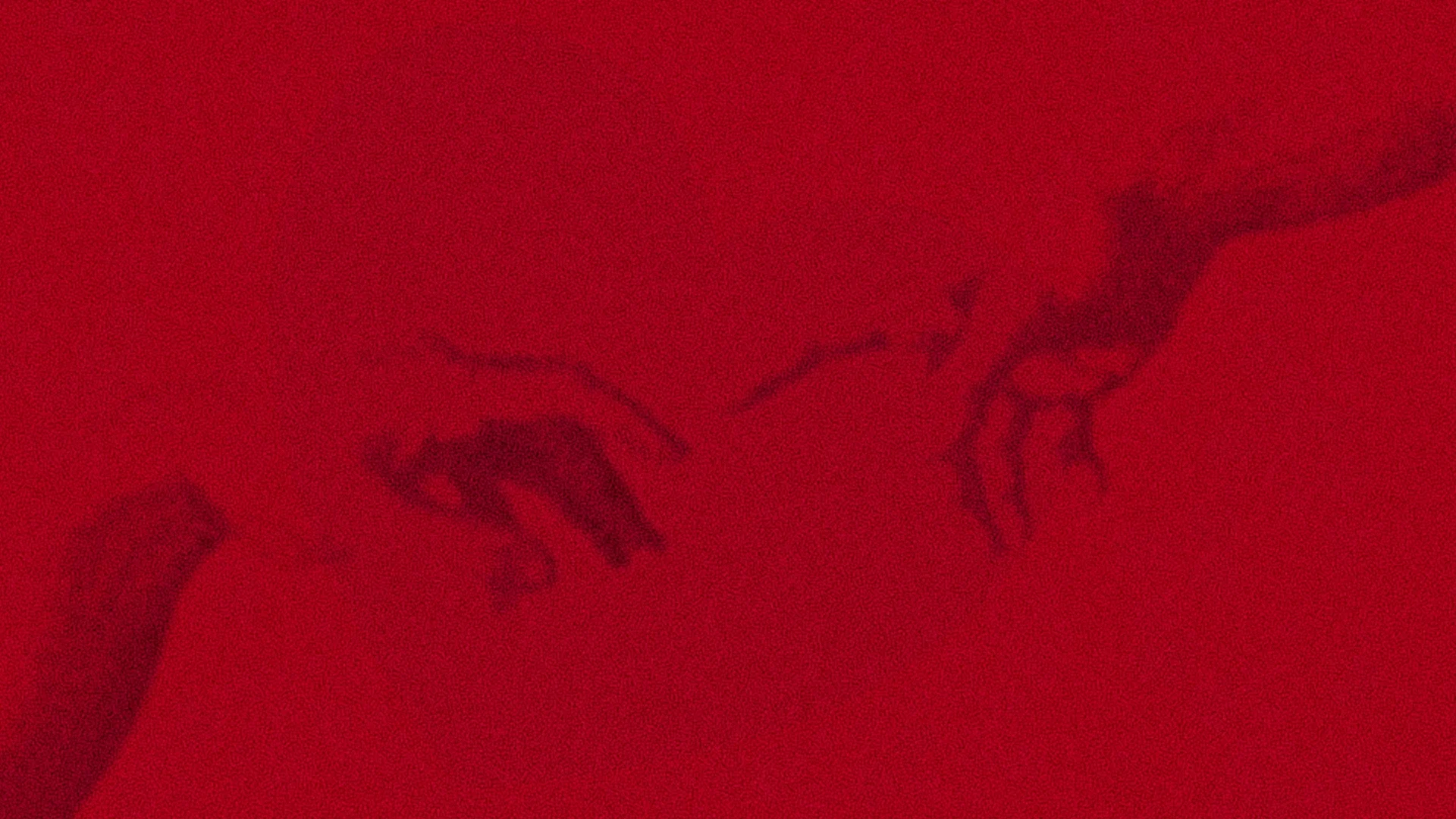 A close-up of a Person's arm reaching towards a hand which has reached down to connect, against red modern background.