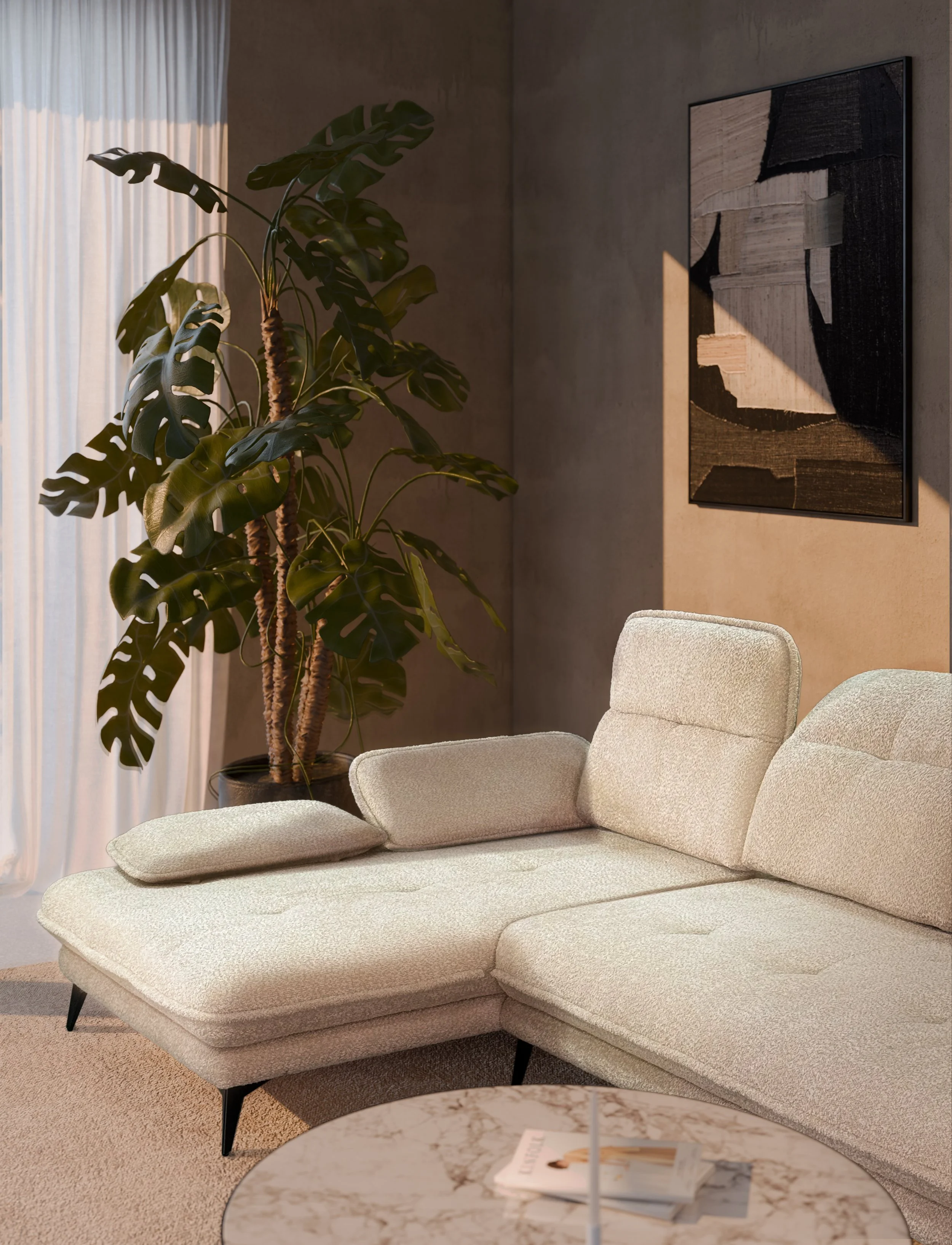 Modern beige sectional sofa in a living room with a large potted Monstera plant and abstract wall art.