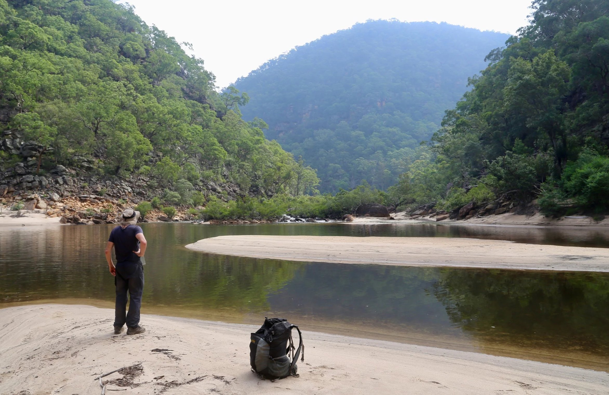 Hiker standing at Junction of Colo and Wollangambe Rivers