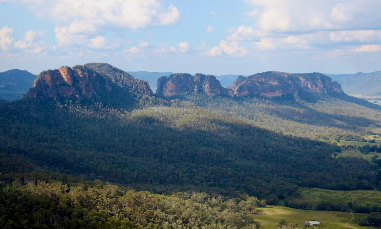 Yodellers Range, Watts Mountain (left), Wedding Cake Mountain (middle), Torrani and Reverelli Mountains (right). 