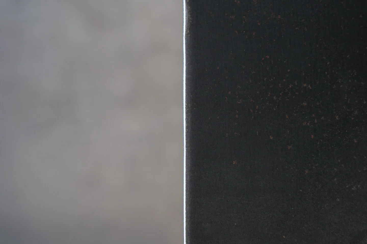 Naturally patinated mild steel.