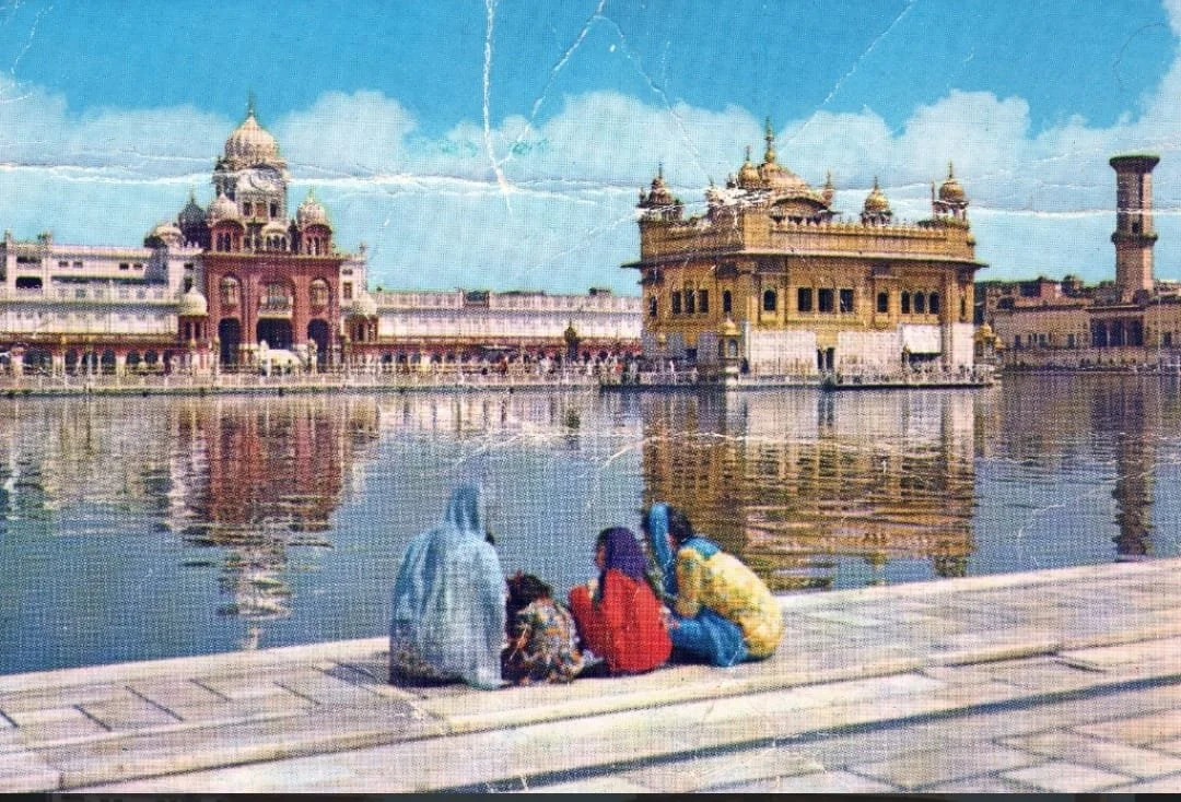 Original - Creased and damaged print of a family at Sri Harmandir Sahib.