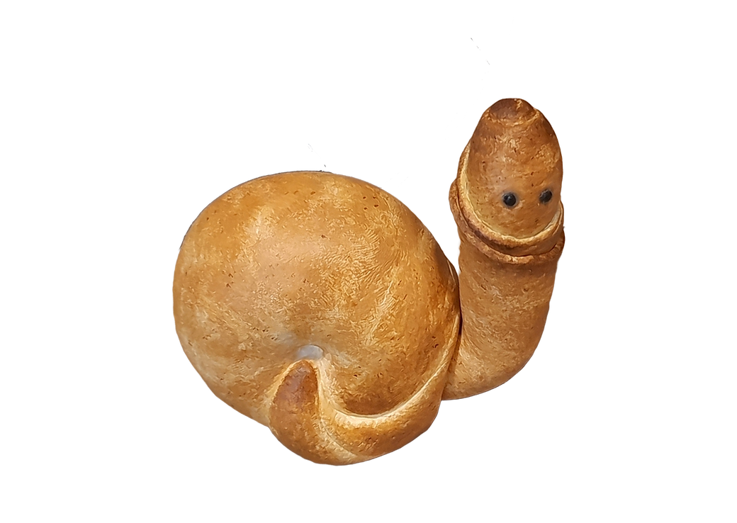 A bread roll shaped like a snail, with a rounded body and a smaller, elongated head with two black eyes.
