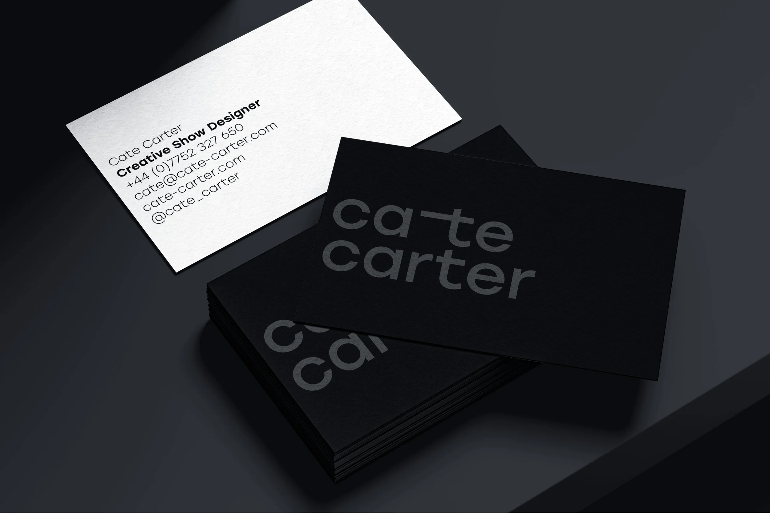 Black and white Cate Carter business cards for her work as a Creative Show Designer.
